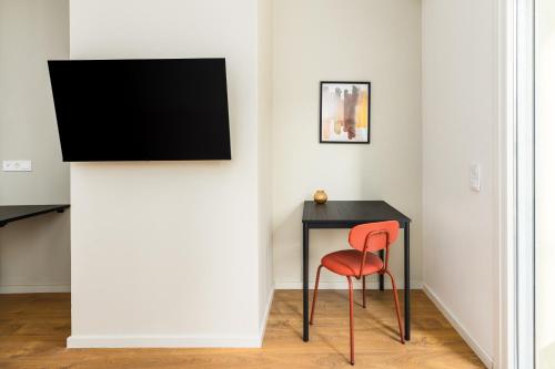 TV a/nebo společenská místnost v ubytování Soho Residence by halu!