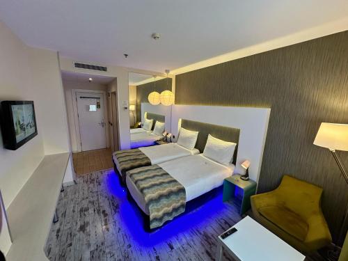 TV a/nebo společenská místnost v ubytování Tempo Hotel 4Levent