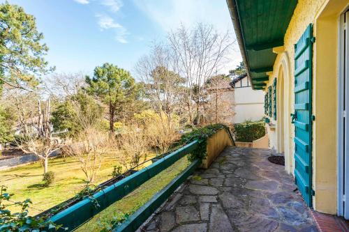 a view from the balcony of a house at Villa Eole - plein centre Hossegor in Soorts-Hossegor