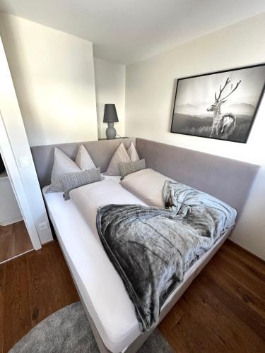 Ένα ή περισσότερα κρεβάτια σε δωμάτιο στο Ferienhaus Mützenzauber