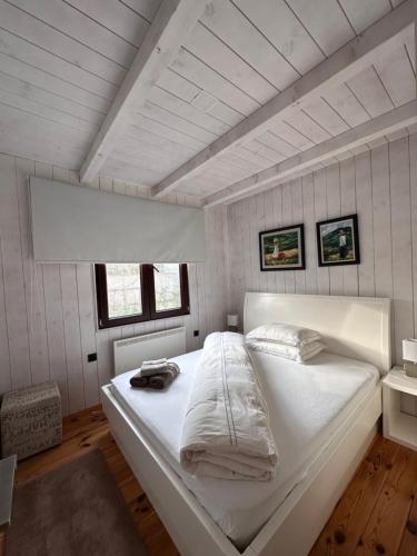 Llit o llits en una habitació de Villa Ana