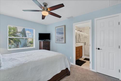 a bedroom with a bed and a ceiling fan at BVC265 Punta Gorda Isles in Punta Gorda