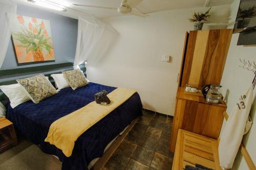 Postel nebo postele na pokoji v ubytování Umlilo Guest House