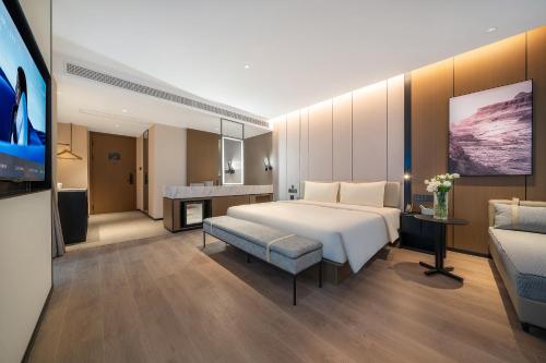 Postel nebo postele na pokoji v ubytování Atour Hotel Dazhou Quxian Wealth Center