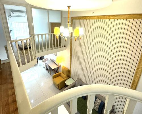 Fotografie z fotogalerie ubytování April Fair Duplex Apartment Guagnzhou South Railway Station Min Jie Branch v Kantonu