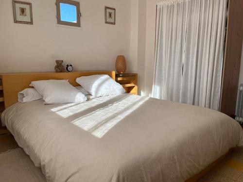 Postel nebo postele na pokoji v ubytování Le Cabanon des Saintes Maries