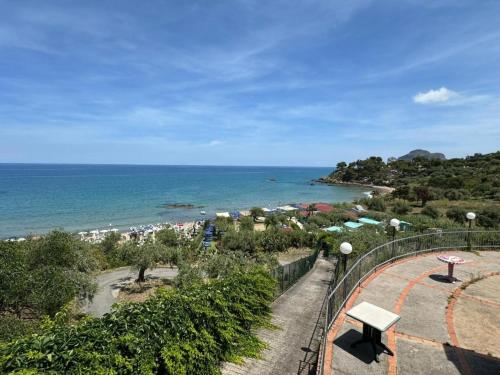 a view of a beach and the ocean at Casa Archi in Cefalù