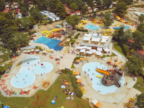 an aerial view of a water park with slides at Valamar Camping Lanterna - Roan in Poreč