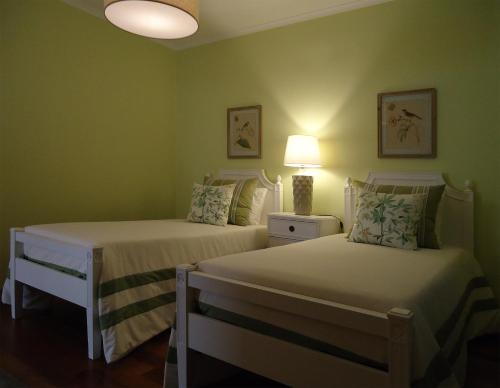 Postel nebo postele na pokoji v ubytování The best sea view in Madeira - Casa Farol