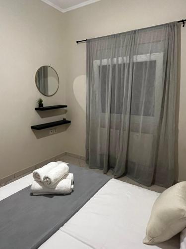 Postel nebo postele na pokoji v ubytování Joel Apartment Alexandroupoli