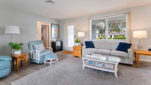 a living room with a couch and chairs and a table at RSL2472 Punta Gorda Isles in Punta Gorda