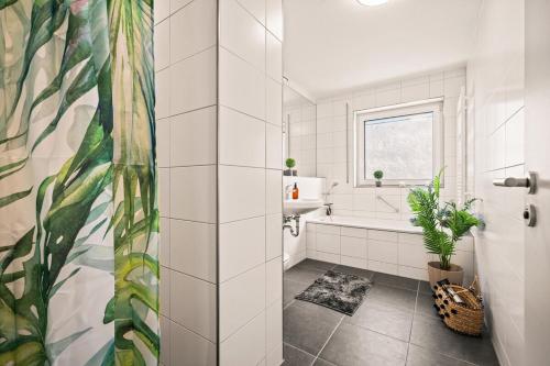 Koupelna v ubytování Oscar's City Apartment