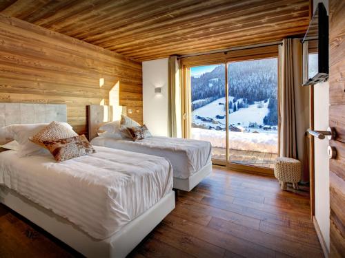 Ένα ή περισσότερα κρεβάτια σε δωμάτιο στο Chalet Alti - OVO Network