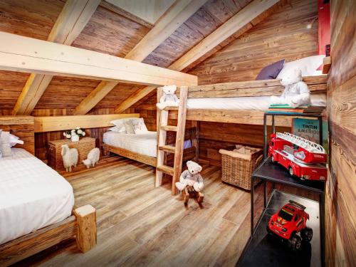 Ένα ή περισσότερα κρεβάτια σε δωμάτιο στο Chalet Alti - OVO Network