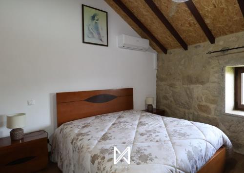 Ένα ή περισσότερα κρεβάτια σε δωμάτιο στο MyStay - O Palheiro