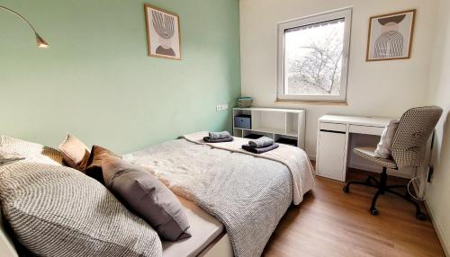 Katil atau katil-katil dalam bilik di Ferienwohnung Traumpanorama im HerberHaus Hunsrück