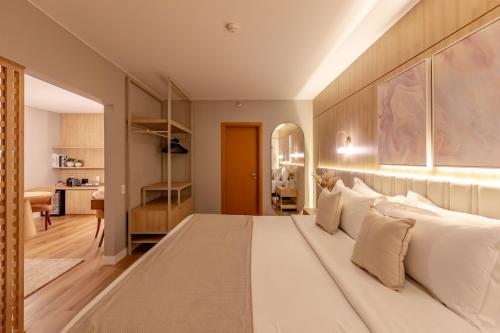 Ein Bett oder Betten in einem Zimmer der Unterkunft Mercure Camboriu