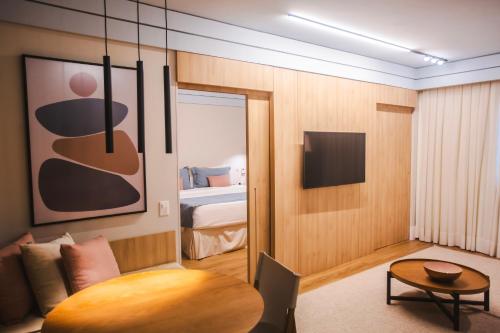 Ein Bett oder Betten in einem Zimmer der Unterkunft Mercure Camboriu