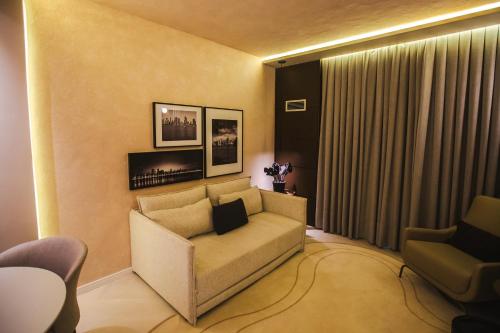 Ein Sitzbereich in der Unterkunft Mercure Camboriu