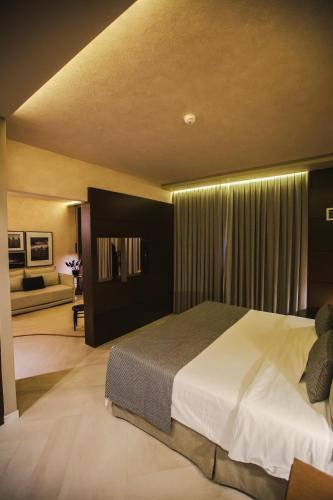 Ein Bett oder Betten in einem Zimmer der Unterkunft Mercure Camboriu