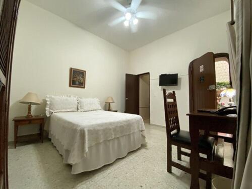 Katil atau katil-katil dalam bilik di Hotel Stein Colonial