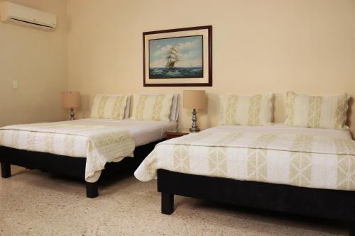 Katil atau katil-katil dalam bilik di Hotel Stein Colonial