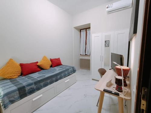 Ένα ή περισσότερα κρεβάτια σε δωμάτιο στο A casa di Cicca