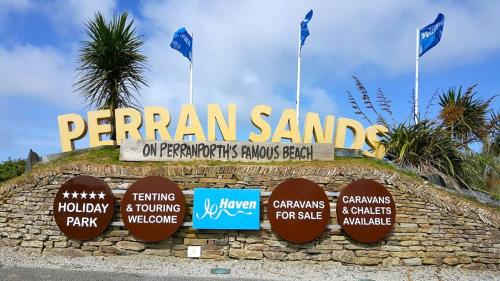 a sign for a parramanian sandwich restaurant at Chalet 151, Perran Sands in Perranporth