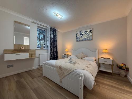 Postel nebo postele na pokoji v ubytování Flat in Surrey