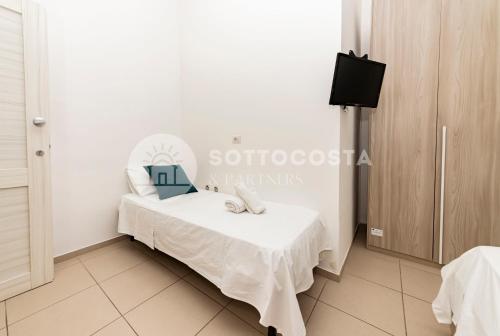 Кровать или кровати в номере La Torre Apartments