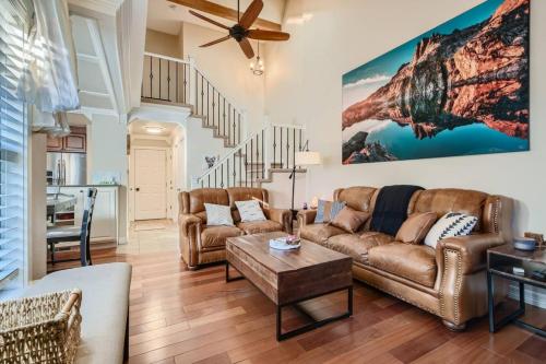 a living room with a couch and a table at Pet Friendly Townhome WIth A Fireplace And A King Bed In Littleton in Littleton