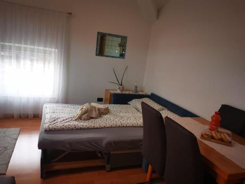 Ένα ή περισσότερα κρεβάτια σε δωμάτιο στο Apartment Anna