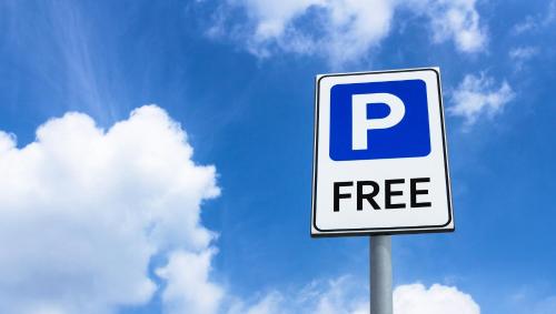 a free sign in front of a cloudy sky at Pearl on the Concho in San Angelo