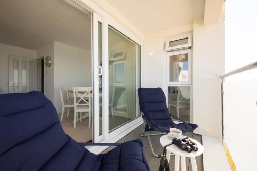 Posezení v ubytování High-End Beachfront Getaway Sea View King Bed