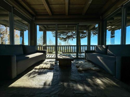 a living room with a couch and a table at Charlton Estate in Yablunytsya