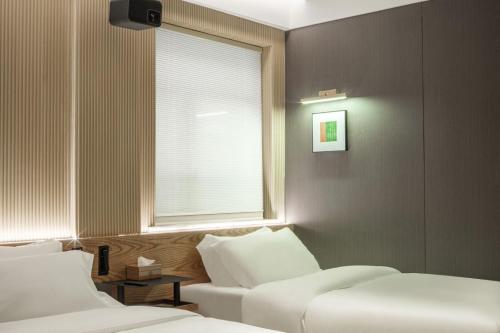 Captain 5 Youth Hotel-Shanghai Laoshan Road Branchにあるシーティングエリア