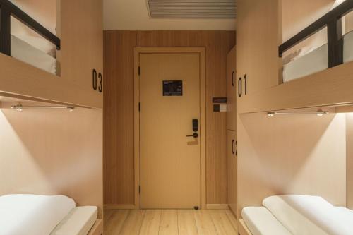 Captain 5 Youth Hotel-Shanghai Laoshan Road Branchにあるシーティングエリア