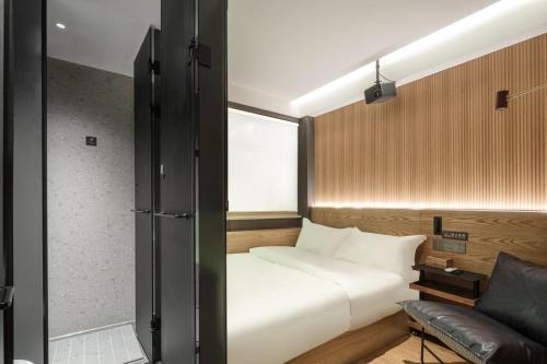 Captain 5 Youth Hotel-Shanghai Laoshan Road Branchにあるベッド