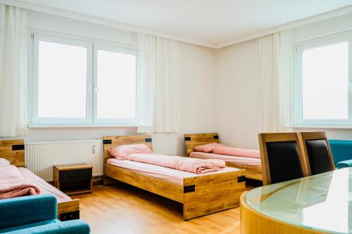 Ένα ή περισσότερα κρεβάτια σε δωμάτιο στο Monteurzimmer Jena Rothenstein
