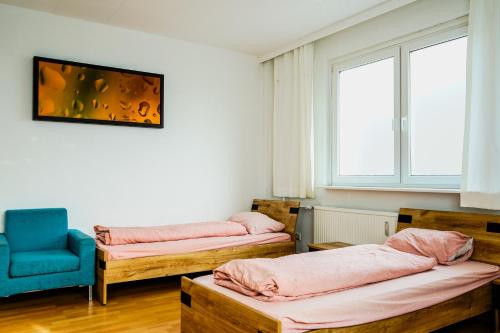 Ένα ή περισσότερα κρεβάτια σε δωμάτιο στο Monteurzimmer Jena Rothenstein