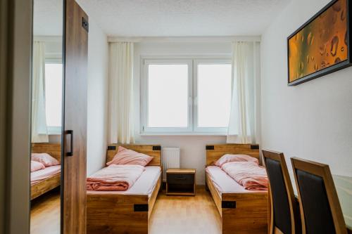 Ένα ή περισσότερα κρεβάτια σε δωμάτιο στο Monteurzimmer Jena Rothenstein