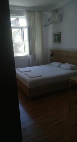 Cama o camas de una habitación en Sakura Inn