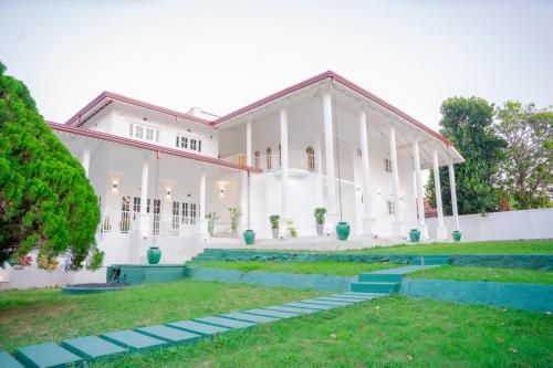Κήπος έξω από το The Heavens Bungalow Katunayake