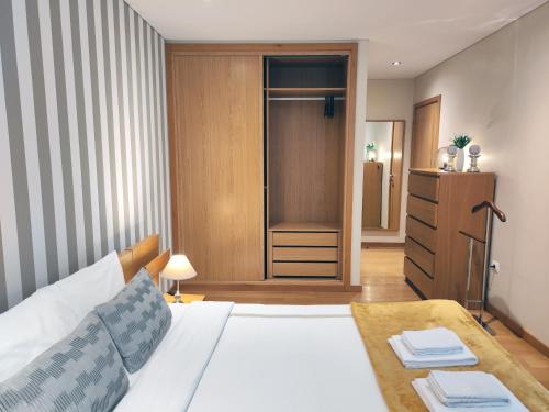 Postel nebo postele na pokoji v ubytování Portus Cale Apartment