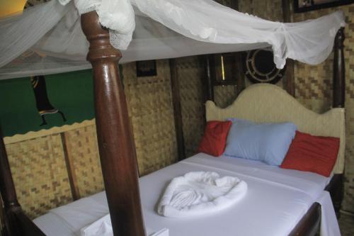 Cama o camas de una habitación en Rock Nature Safaris Lodge