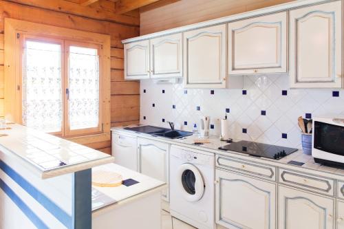 Η κουζίνα ή μικρή κουζίνα στο Résidence Au pré de l'arbre