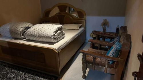 Ένα ή περισσότερα κρεβάτια σε δωμάτιο στο Agora homestay