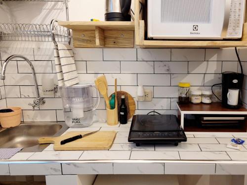 Cuina o zona de cuina de Executive Suite OF101