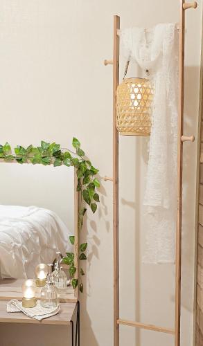 a dressing table with a mirror next to a bed at Lucky Vicky House in Seoul