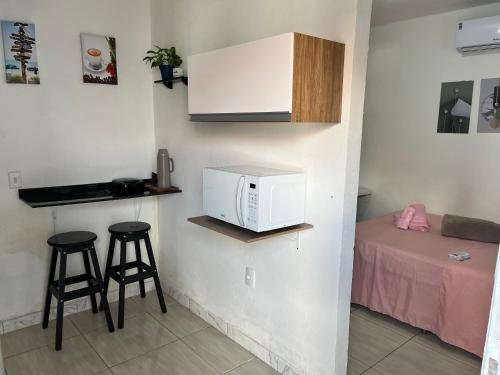 Dapur atau dapur kecil di Brisa da Ilha - Estúdios ao lado do aeroporto